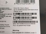 the back of a cell phone with a bar code on it