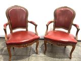 pair of red leather chairs