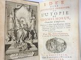 an old book with a picture of a man and a woman on it