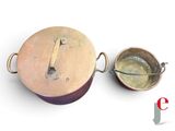 a pot with a handle and a bowl with a lid