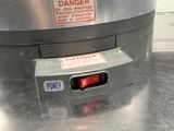 a close up of a machine on a metal surface