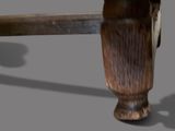 a close up of a wooden bench with a wooden seat