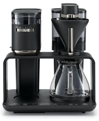the coffee maker is on a stand with two cups on it