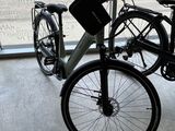 a bike that is parked in front of a window