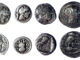 six ancient roman coins with faces and heads on them