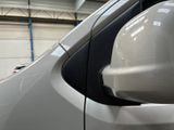 a close up of a side view mirror on a car