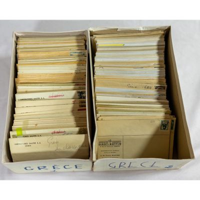 a box filled with lots of old envelopes sitting on top of a table