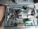 a tool in a case that is sitting on the floor