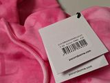 a pink shirt with a bar code on it