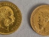 two gold coins with a portrait of a man and a woman on them