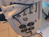 a machine that is sitting on the floor in the room