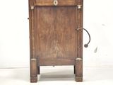 pair of antique wooden nightstands with brass handles and drawers