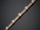 a diamond and gold bracelet, by cartier