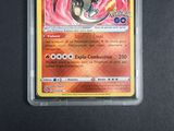 a close up of a pokemon card on a table