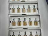 a lot of padlocks that are on display in a box
