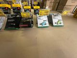 many boxes of electronics on the floor in the store