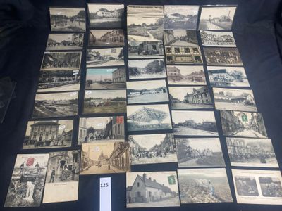 a lot of old postcards that are on the table