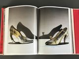 a book with a picture of a pair of shoes on it
