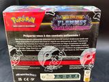 a box of pokemon figurines sitting on top of a car seat