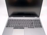 dell laptop computer with keyboard and mouse on white surface