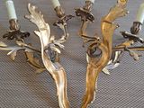 pair of antique brass wall sconces with leaves and candles