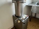 a machine that is sitting in the corner of a room
