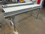 a conveyor belt in the middle of a room