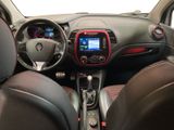 the interior of a small car with a steering wheel and dashboard