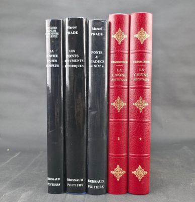 three red and black books sitting next to each other on a table