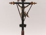 wooden crucifix with a cross on top of it on a white background