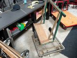 a room with a desk, chair, and other items in it