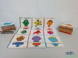 many children ' s books that are on the table