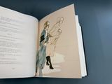 an open book with a drawing of a man and a woman on it