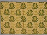an image of a yellow and green cloth with a pattern of flowers