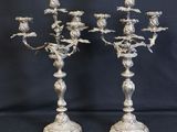 pair of antique silver plated candelabs with birds and flowers