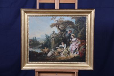 tableau sur chevalet représentant une famille dans un paysage