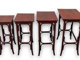 three tables with stools on each side of them on a white background