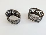 pair of antique silver filigree napkin rings with filigree design