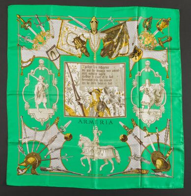 green silk scarf with a picture of a man on a horse and other items