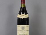 a bottle of wine that is sitting on a table