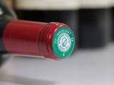 a close up of a bottle of wine on a table