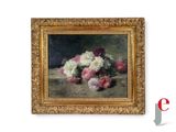 une photo d'un tableau de fleurs dans un cadre doré