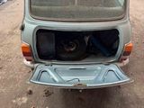 a small car that is parked on the side of the road