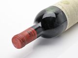 a bottle of wine that is sitting on a table