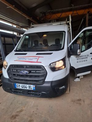 a white van that is parked in a garage