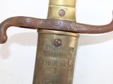 a close up of a knife with a handle on it