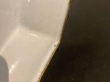 a dirty bathroom with a toilet and a sink