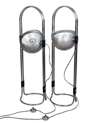 pair of chromed metal table lamps on stands with cord
