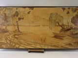 une image d'un tableau sur le mur d'une pièce