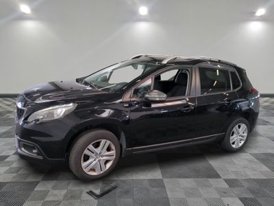 a picture of a black car parked on a checkered floor